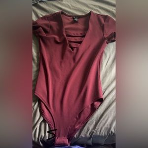 a one piece body suit. rue 21. size small.